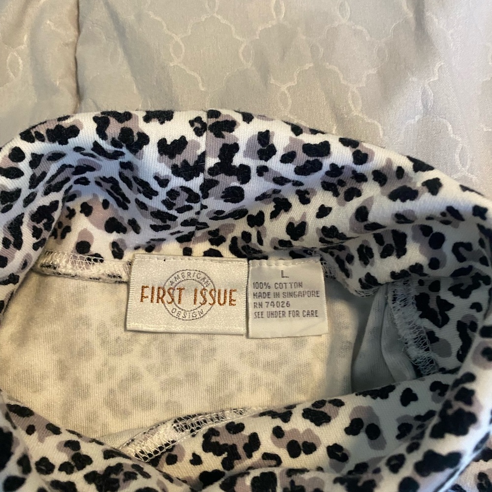 Black/white leopard print turtleneck